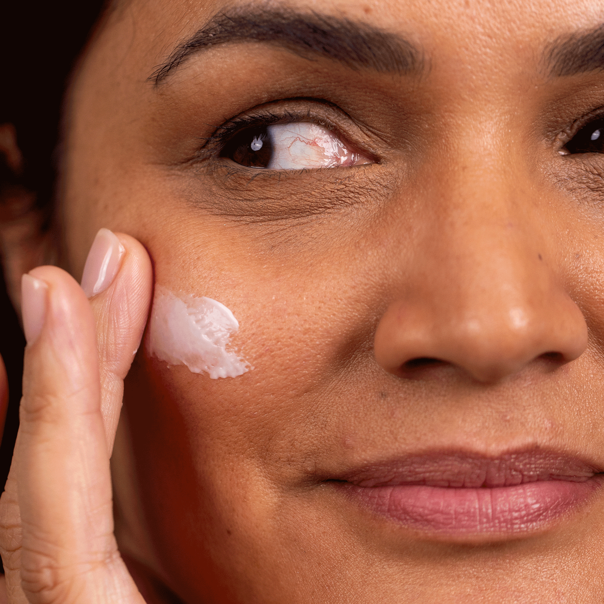Vital Moisturising Cream application GIF with model.