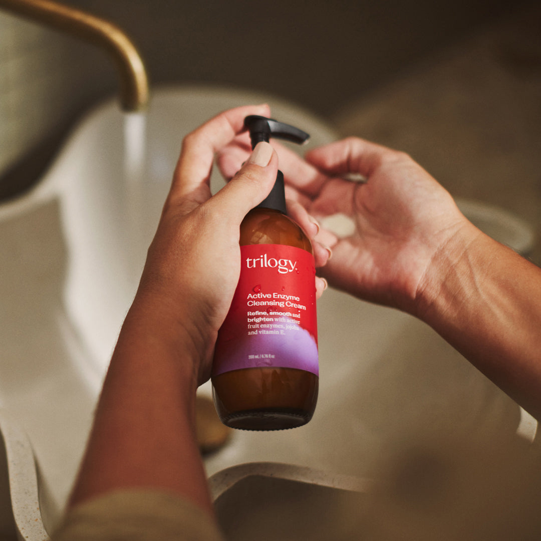 Active Enzyme Cleansing Cream in hand.