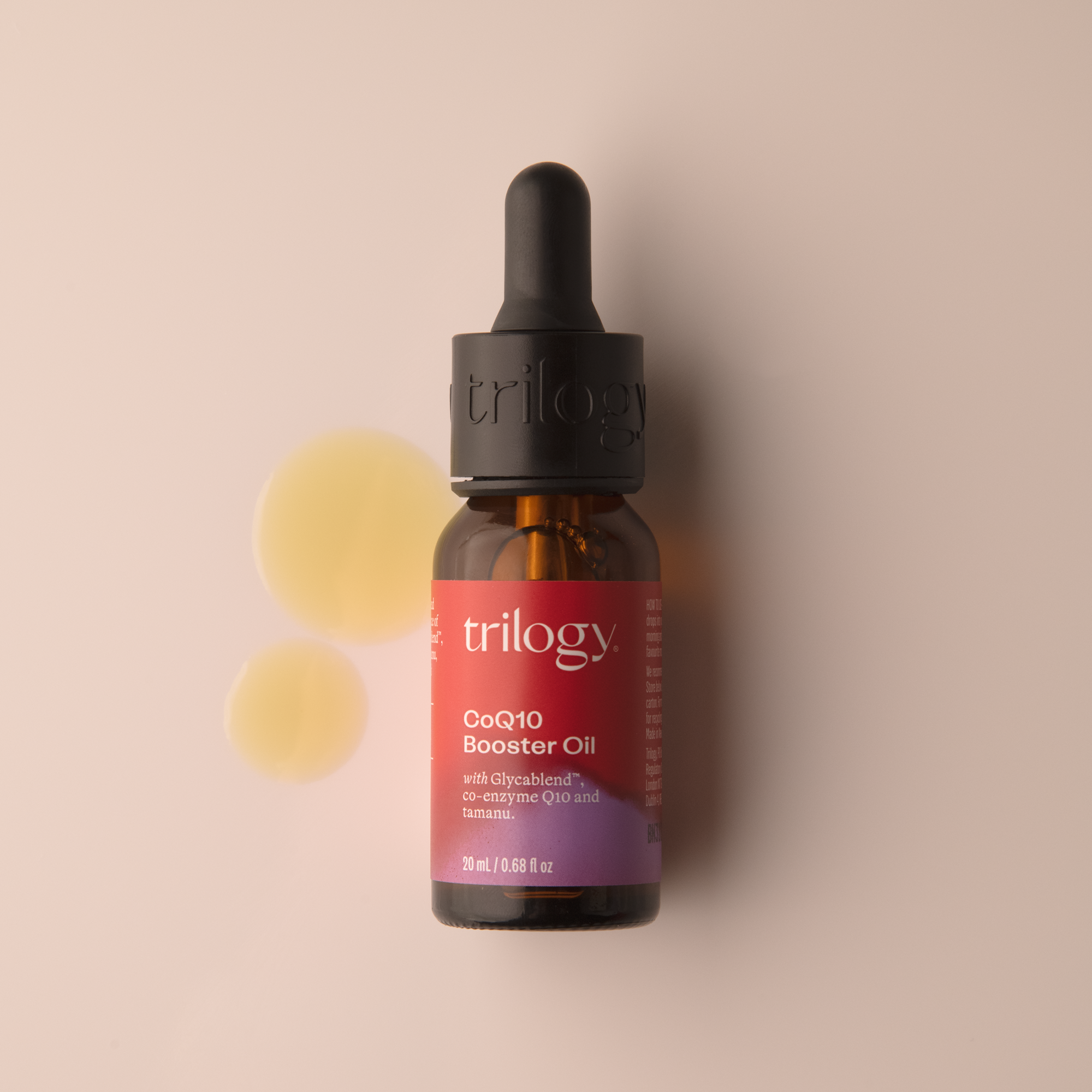 Trilogy Skincare CoQ10 Booster Oil with swatch.