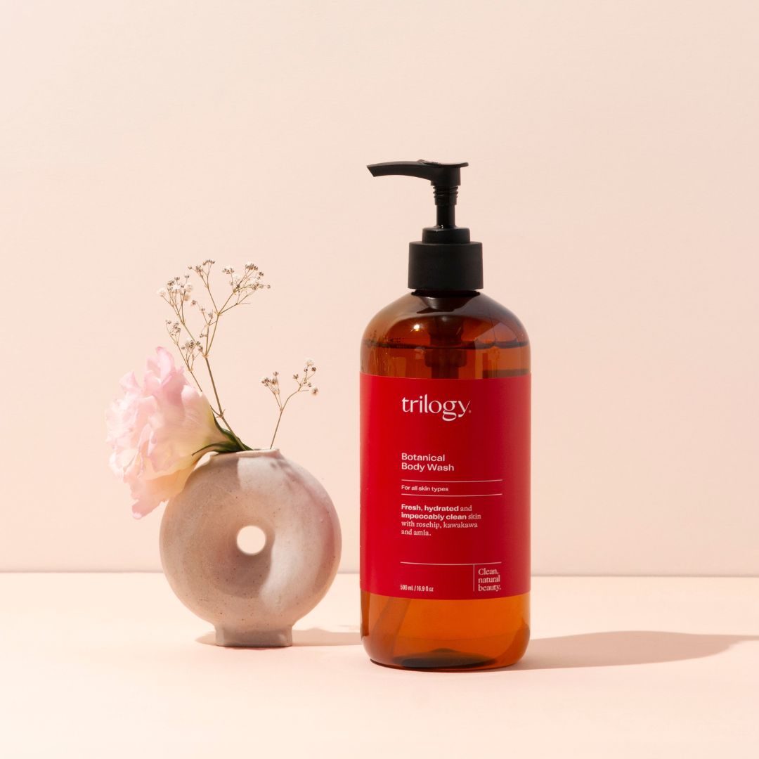 Botanical Body Wash with flowers and vase.
