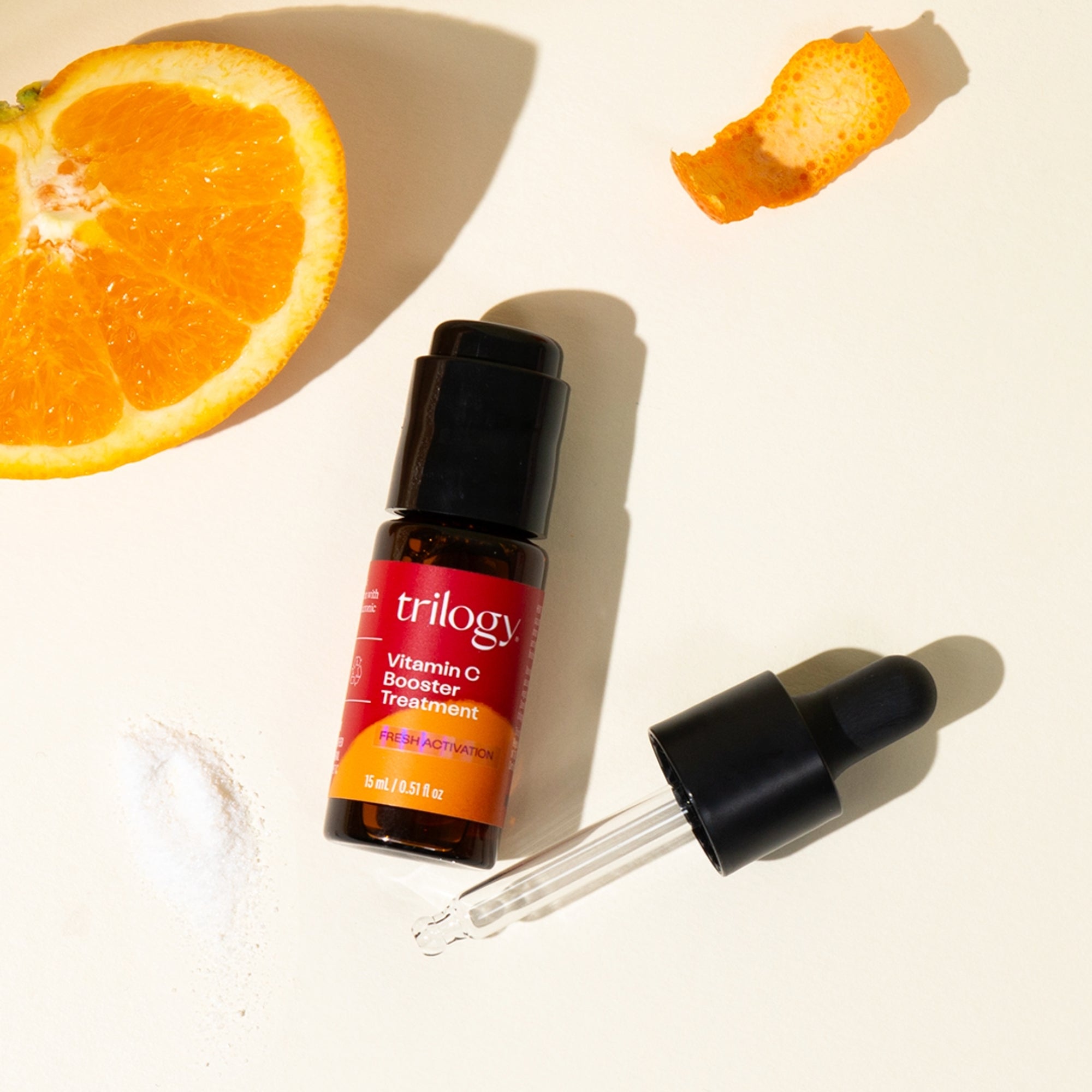 Vitamin C Booster Treatment packaging with dropper and orange to promote the vitamin c benefit.