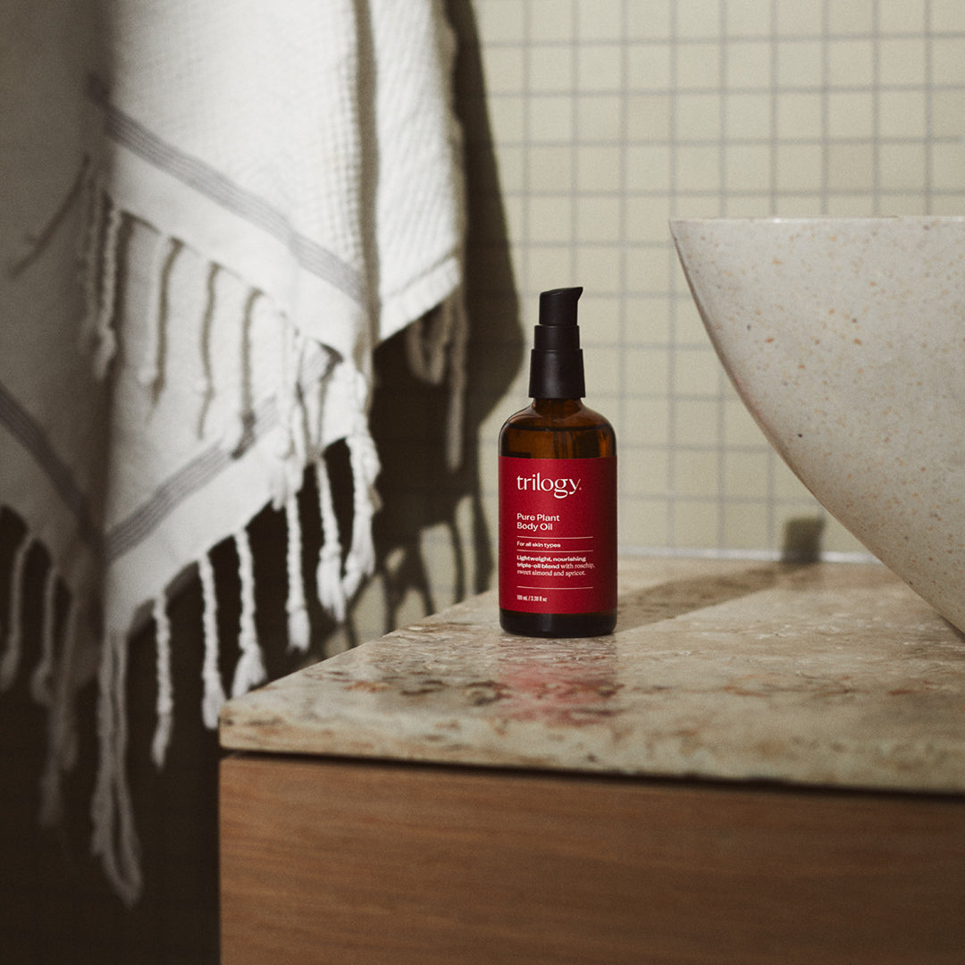 Pure Plant Body Oil in a bathroom.