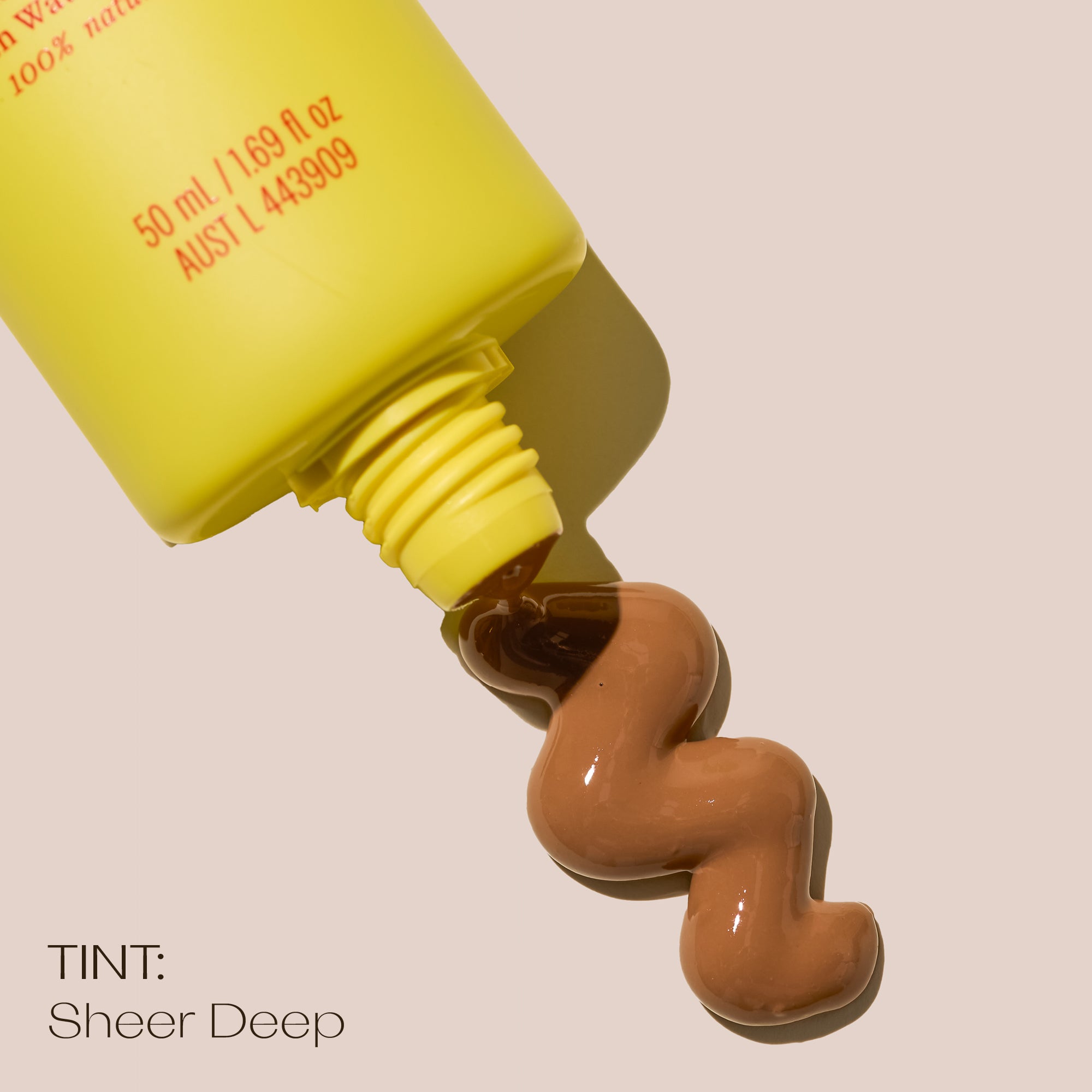 SPF 50+ Sheer Tinted Moisturising Sunscreen deep with the product showing the texture.