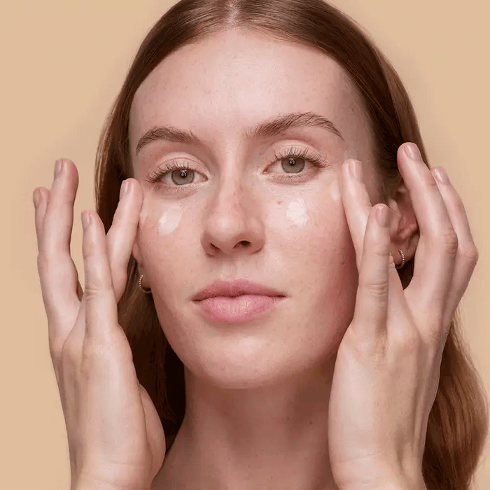 Eye Contour Cream model application.