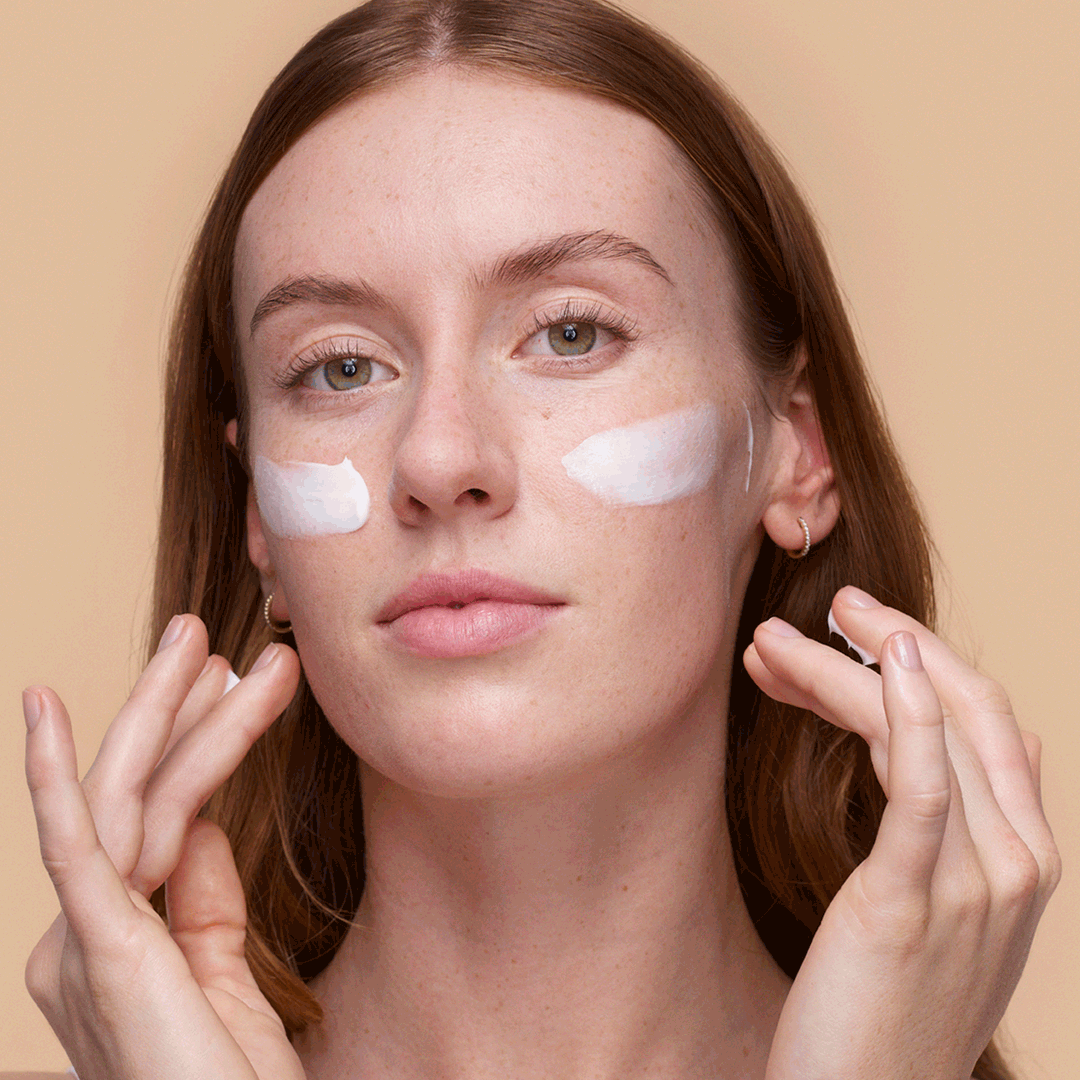 Very Gentle Moisturising Cream application on skin with model.