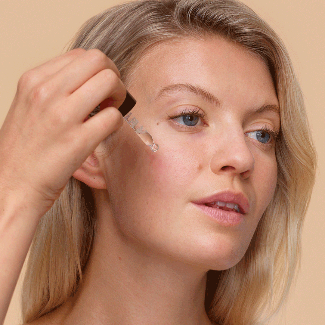 Vitamin C Booster Treatment application with model GIF.
